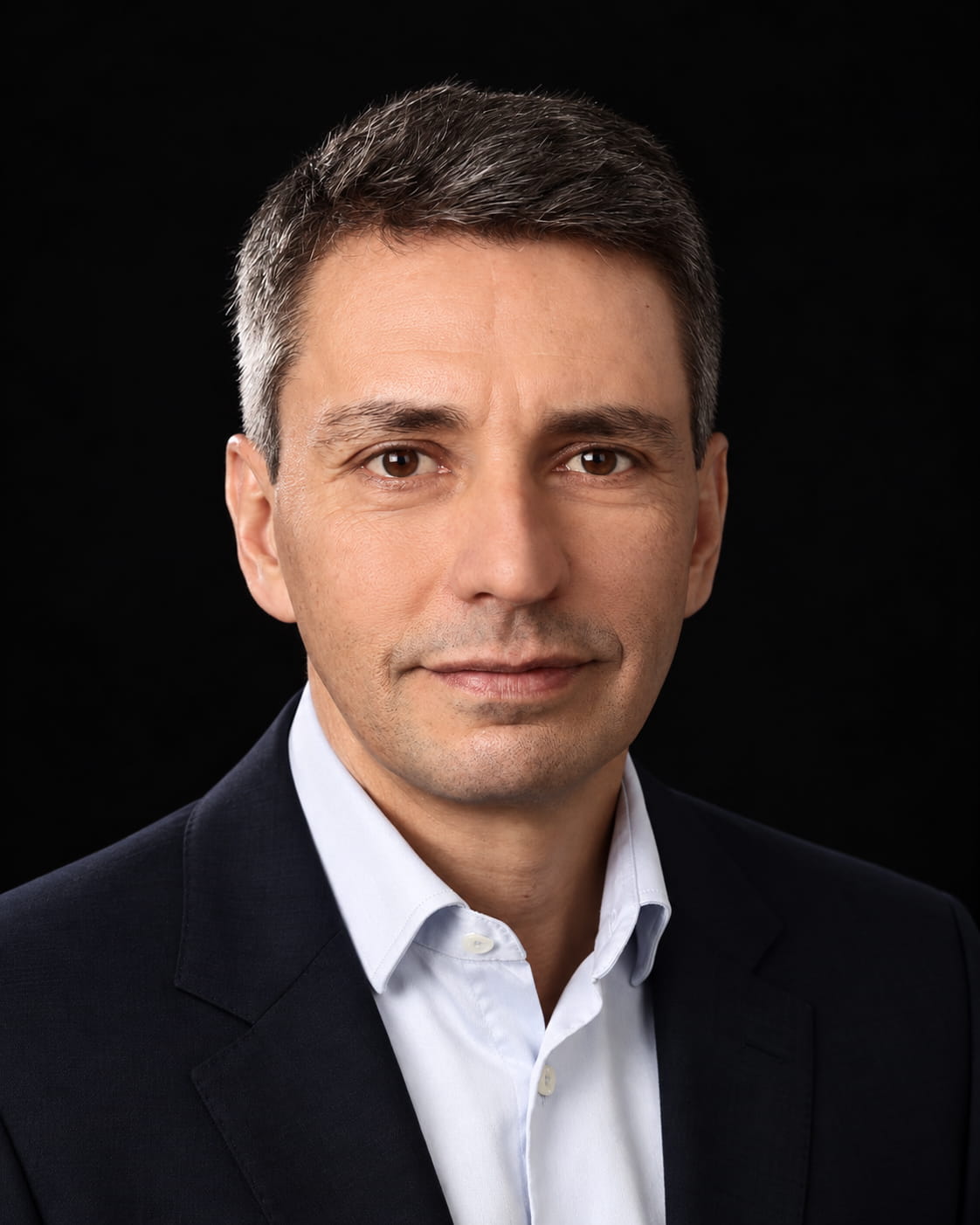 A professional photo of Dr. Sari Abwa